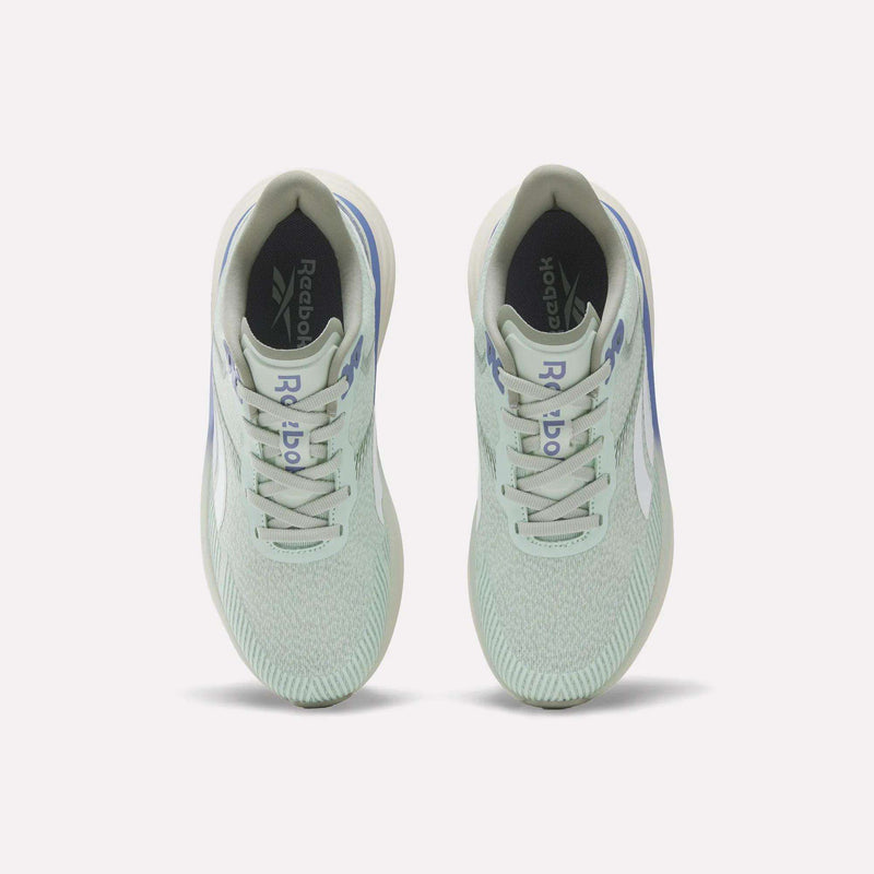 A top view of a pair of Women's Viva Speed Shoes by Reebok in mint green, featuring white soles and light blue accents, displayed on a plain light background. These breathable shoes are designed with a cushioned midsole for enhanced comfort and support.