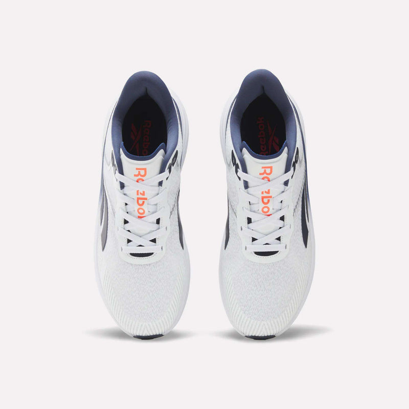 A pair of Men's Viva Speed Shoes by Reebok in white with navy and orange accents, shown from above on a light background. Designed for breathability and cushioned support, these shoes are ideal for running and everyday comfort.