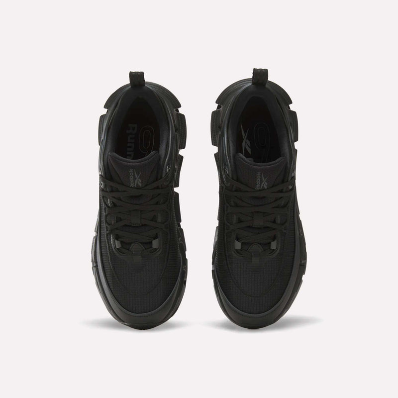 A top view of a pair of Reebok Floatzig Encore Running Shoes in black with laces, displayed against a plain white background. These shoes showcase a textured surface, looped pull tabs on the heels, and feature design elements ideal for walking and fitness activities.