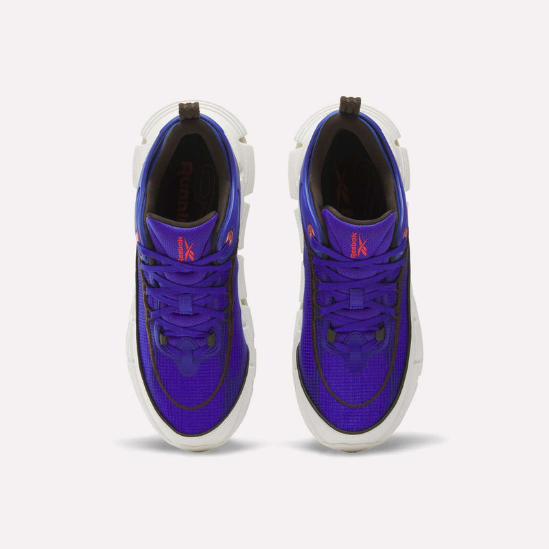 A pair of Reebok Floatzig Encore Running Shoes in purple with black details, white soles, and orange logo accents—these stylish sneakers featuring Zig technology are perfect for walking and fitness, shown from above on a white background.