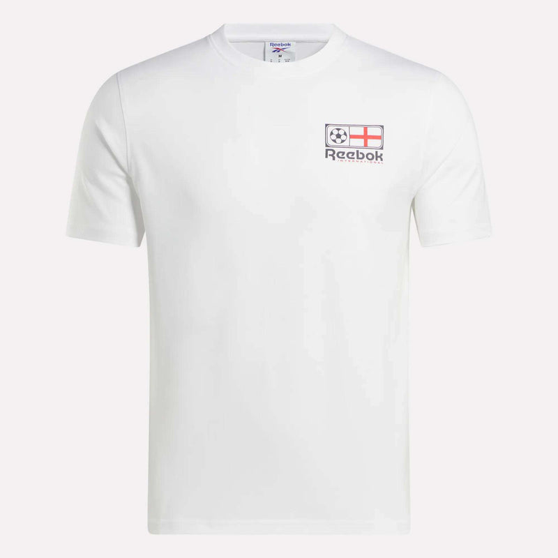 The Reebok England Football T-Shirt features a white, short-sleeve cotton design with a small England flag, soccer ball, and Reebok logo on the left chest—ideal for fans of classic England shirts.