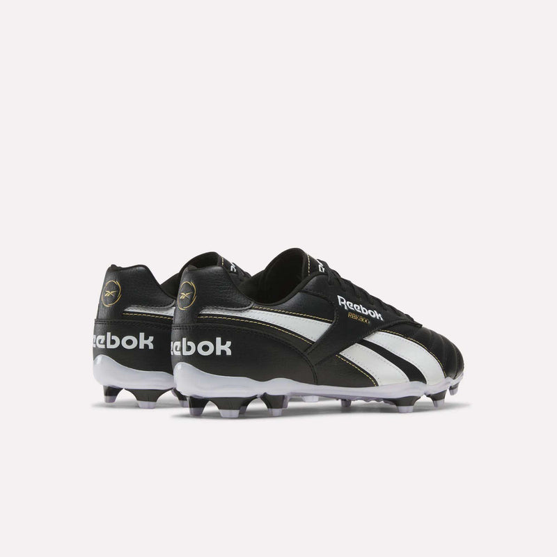 Black and white Reebok RBK800 League Firm Ground Soccer Cleats featuring a molded stud sole for reliable traction.