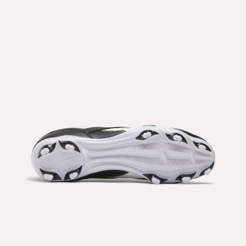 Bottom view of a black and white RBK800 League Firm Ground Soccer Cleat, highlighting the white outsole and stud configuration designed for firm ground traction.