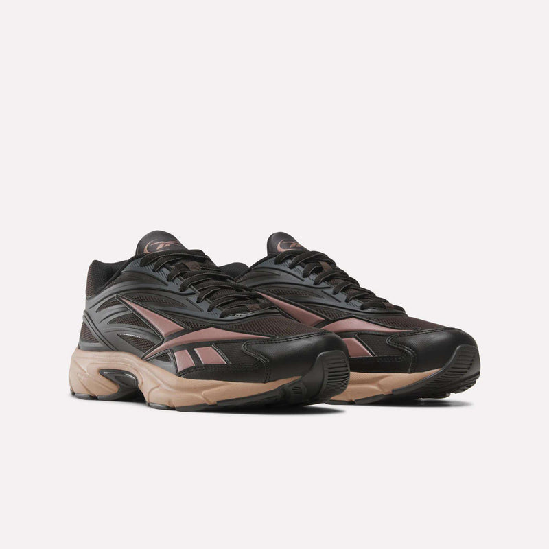 Black and metallic bronze Reebok Premier Road 1000 Shoes featuring retro mesh panels and thick, tan rubber outsoles.
