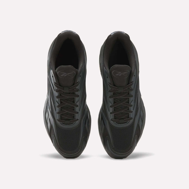 A pair of black Reebok Premier Road 1000 Shoes viewed from above on a plain white background, showcasing their mesh and synthetic construction with the Reebok logo visible on each tongue—a classic nod to Y2K style with a timeless athletic silhouette.