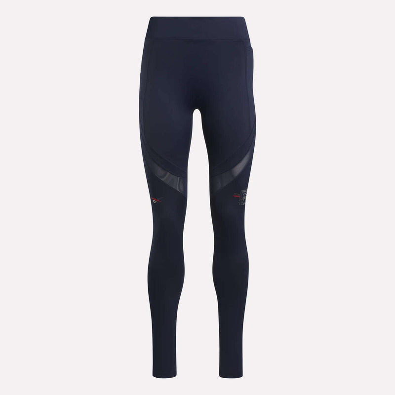 Women's Reebok x F45 Training Coach Lux Leggings in navy blue featuring a high waistband and mesh thigh panels, designed for high-intensity workouts, shown on a plain white background.
