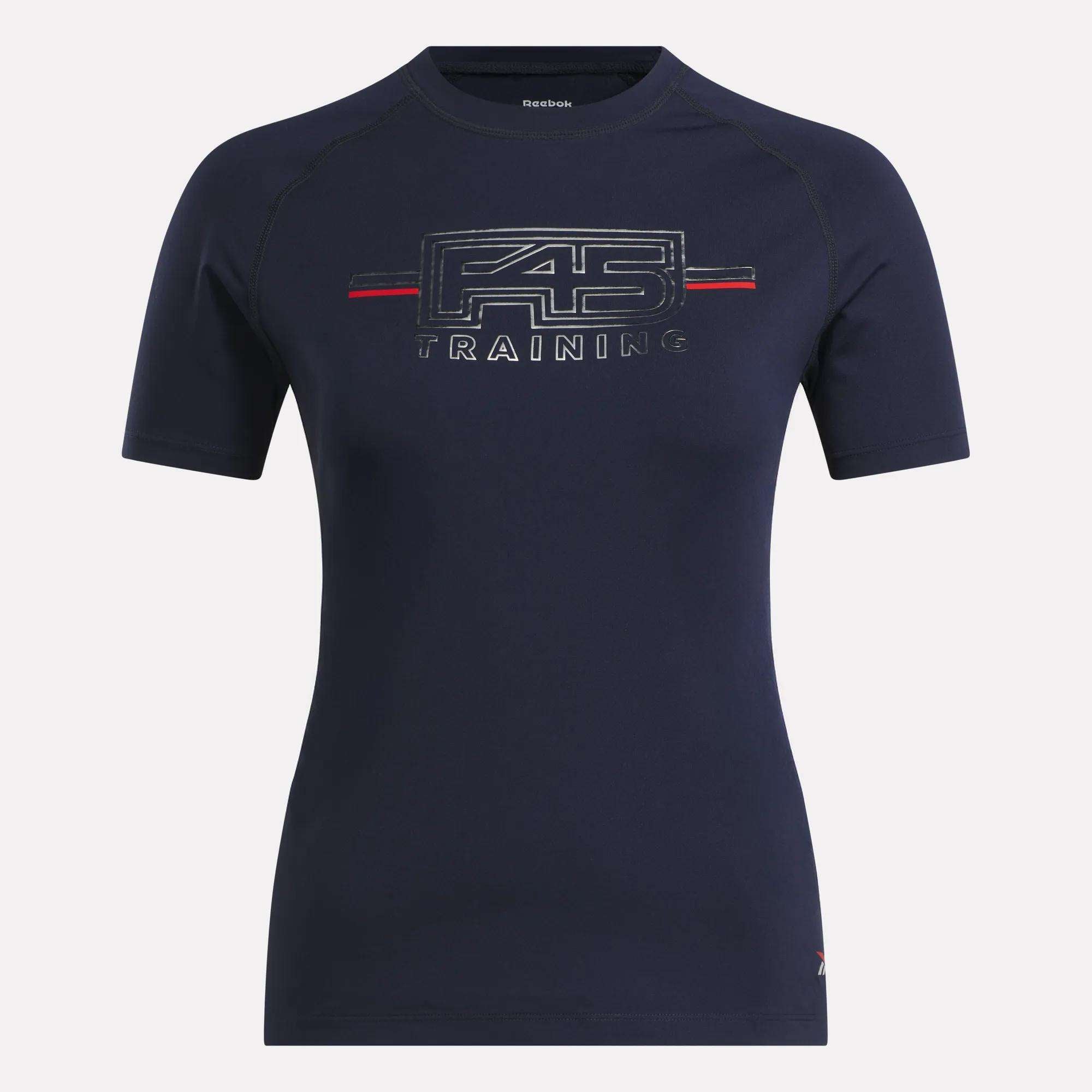 The Women's Reebok x F45 Training Coach T-Shirt is a navy athletic tee for high-intensity workouts, featuring bold F45 TRAINING print with red accents, a fitted cut, sweat-wicking fabric, and a classic crew neck.