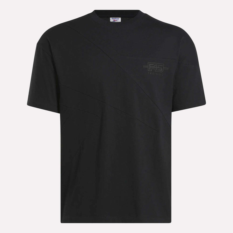 The Reebok x F45 Training Relaxed T-Shirt is a plain black tee with a subtle diagonal seam and small RS logo on the chest, featuring a crew neck and relaxed fit—ideal for workouts or F45 Training sessions.