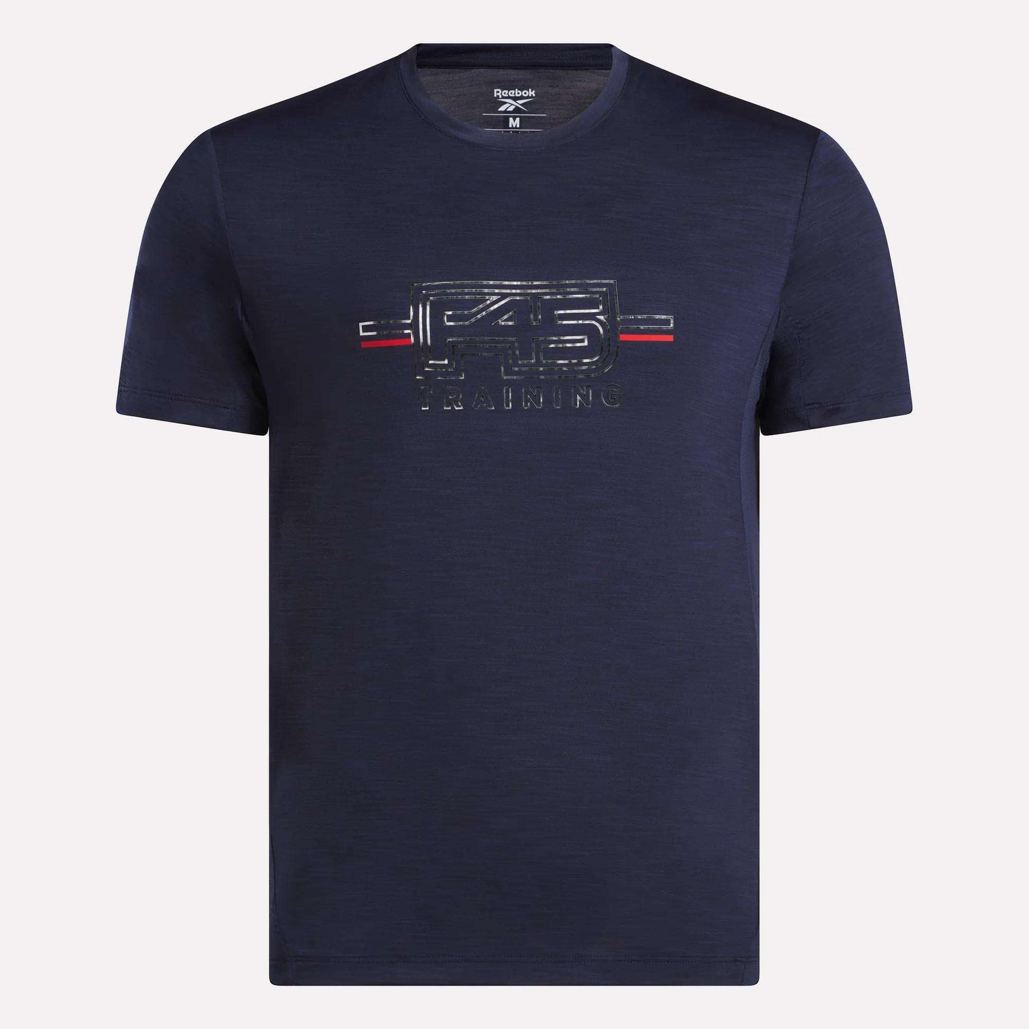 Men's Reebok x F45 Training Coach T-Shirt in navy with short sleeves, featuring a subtle F45 logo and red, white, and blue chest stripes.