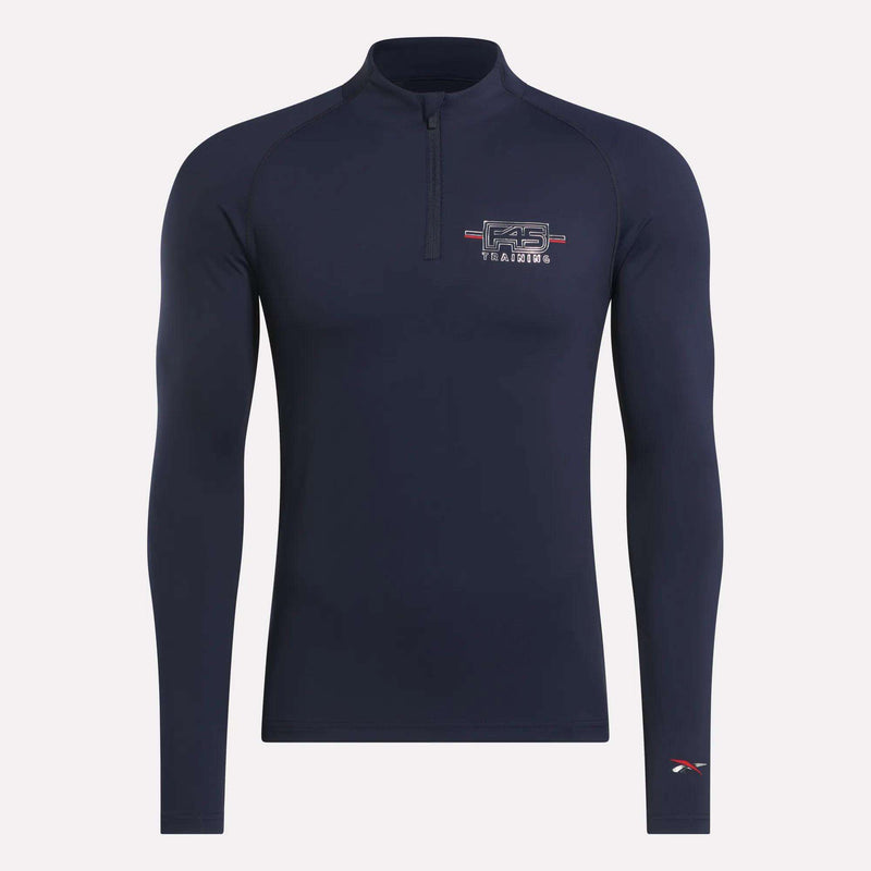 The Men's Reebok x F45 Training Coach Quarter-Zip Top is a navy blue long-sleeve featuring the F45 Training logo on the chest and a small Reebok logo on the left sleeve, shown against a plain white background.