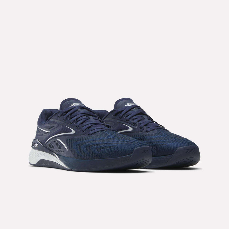 A pair of Reebok Nano X5 Edge F45 Shoes in navy blue with white accents and textured details, shown on a plain white background.