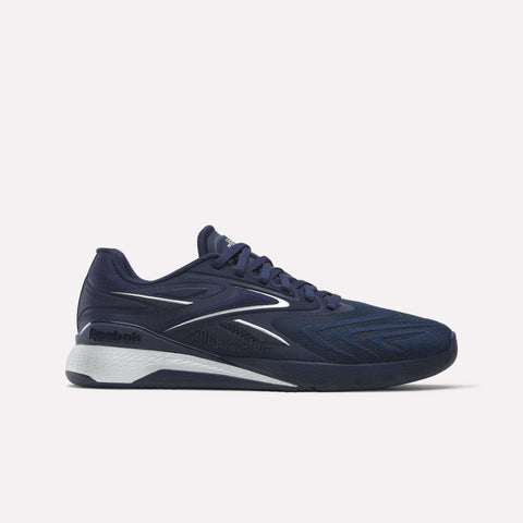 The Reebok Nano X5 Edge F45 Shoes feature a textured navy upper with silver accents, lace-up closure, and a white and gray sole—designed for F45 and performance training—shown against a plain white background.