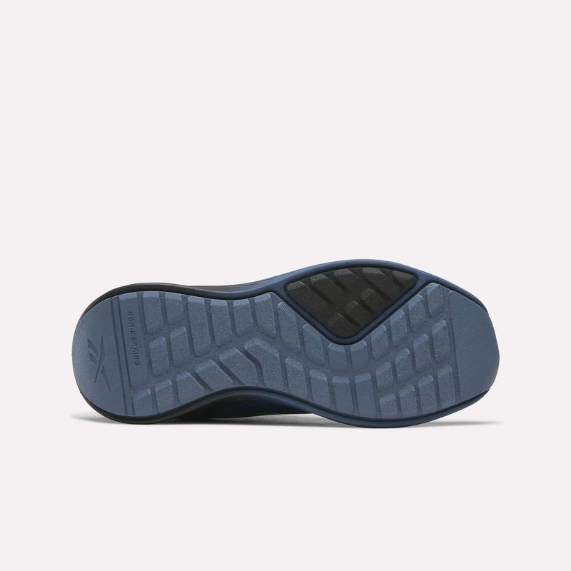 The image shows the sole of the Reebok Energen Running Shoes for little kids in blue, featuring a textured tread pattern and a black section near the top. The Reebok logo appears on the left side of the sole.