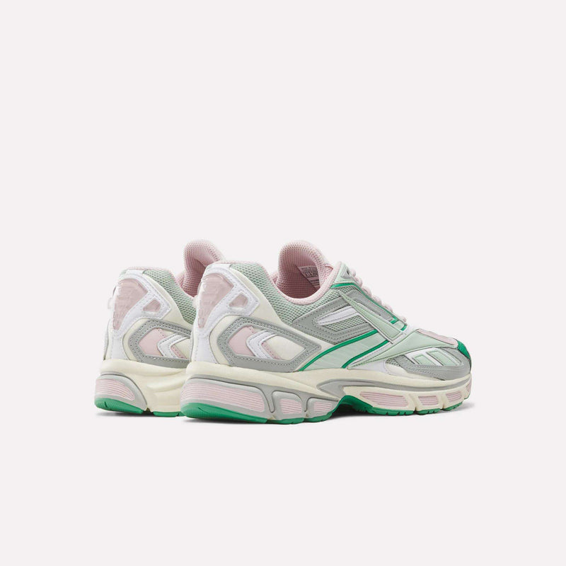 A pair of pastel-colored Premier Road Ultra SV Shoes by Reebok, featuring light pink, green, and off-white accents, displayed at an angle on a plain white background for a subtle Y2K shoes vibe.