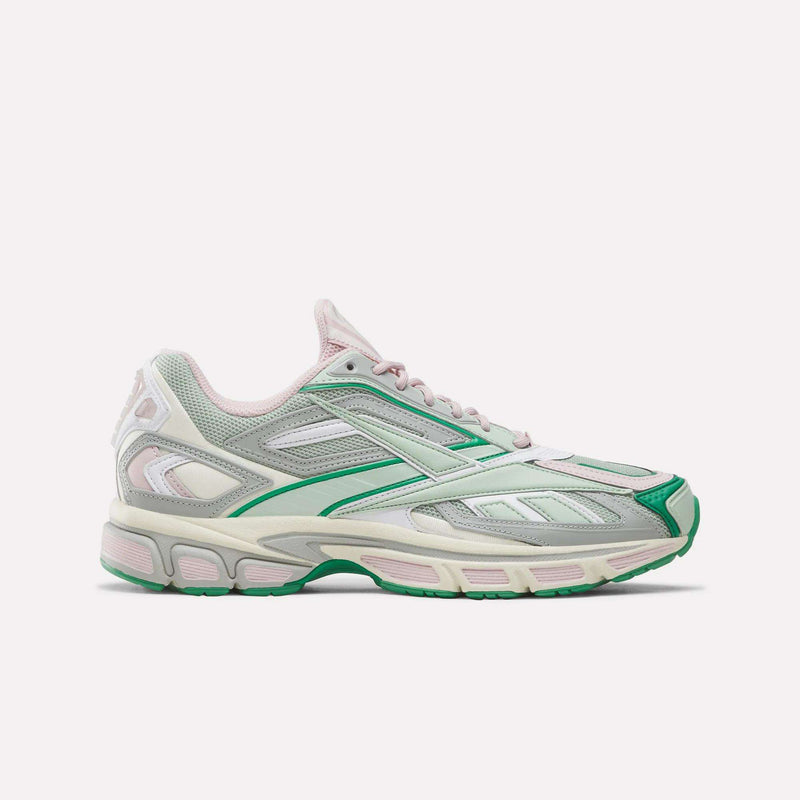 Introducing the Reebok Premier Road Ultra SV Shoes—a pastel sneaker inspired by Y2K styles, featuring mesh and synthetic panels in Light Sage, Elemental Pink, and Vintage Chalk. With a white midsole accented with green and pink details and a green outsole, this design echoes the statement style of classic Reebok running sneakers.
