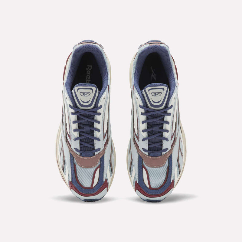 A pair of Reebok Premier Road Ultra SV Shoes, featuring blue, white, and maroon accents in an athletic running sneaker design inspired by the Reebok Premier Road Y2K shoes, viewed from above on a white background.