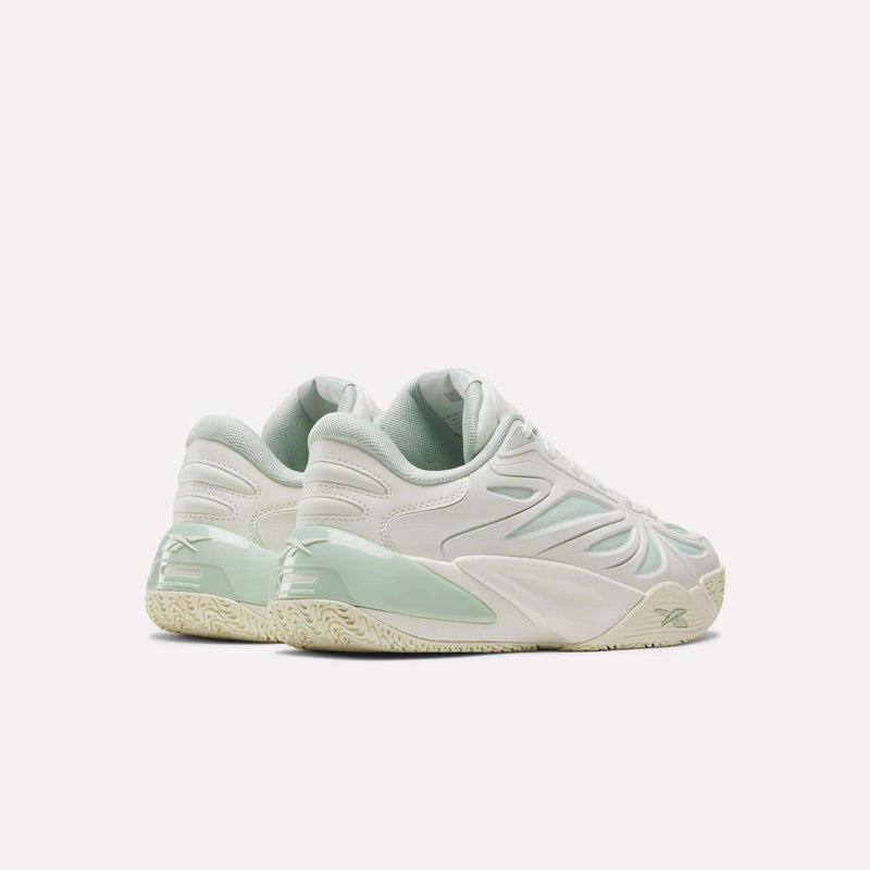 A pair of white and pastel green Angel Reese 1 Basketball Shoes by Reebok, featuring textured soles, Reebok branding on the heel, and wavy side patterns—these performance basketball sneakers are equipped with the innovative Reebok Energy Return System for enhanced comfort and support, displayed against a plain white background.