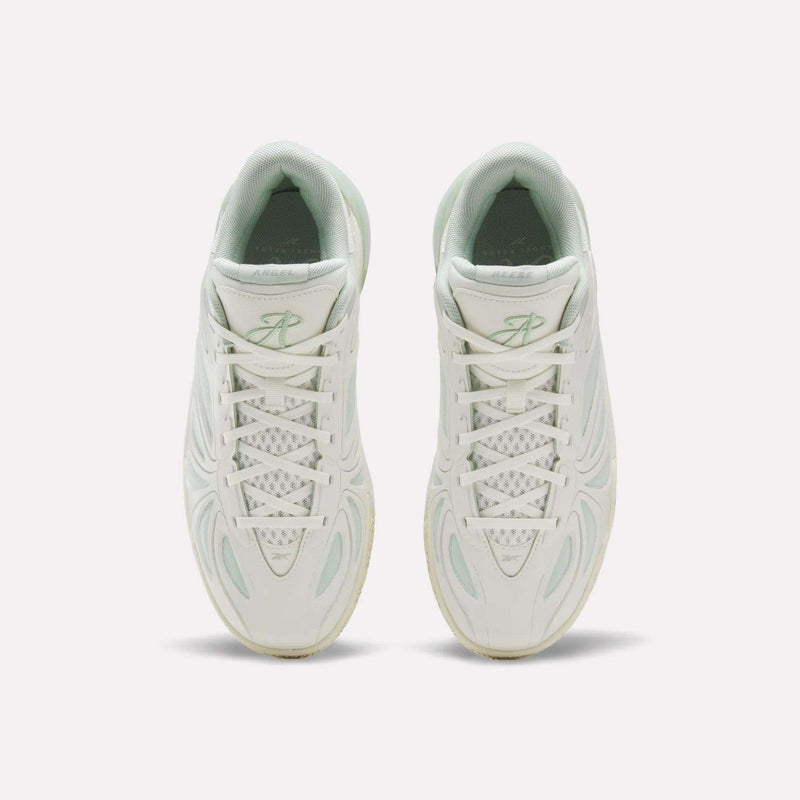 A pair of Reebok Angel Reese 1 Basketball Shoes in white with light green accents is shown from above on a plain white background. Inspired by Angel Reese basketball shoes, these performance sneakers feature a unique pattern, white laces, and the advanced Reebok Energy Return System for enhanced comfort and support.