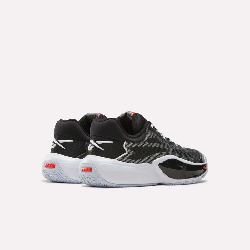 The Reebok Engine A 26 Basketball Shoes are shown from the back and side on a plain white background. This pair features a black engineered mesh upper with red accents and white soles, offering enhanced breathability and support. Designed for speed, they effortlessly combine style and performance on the court.