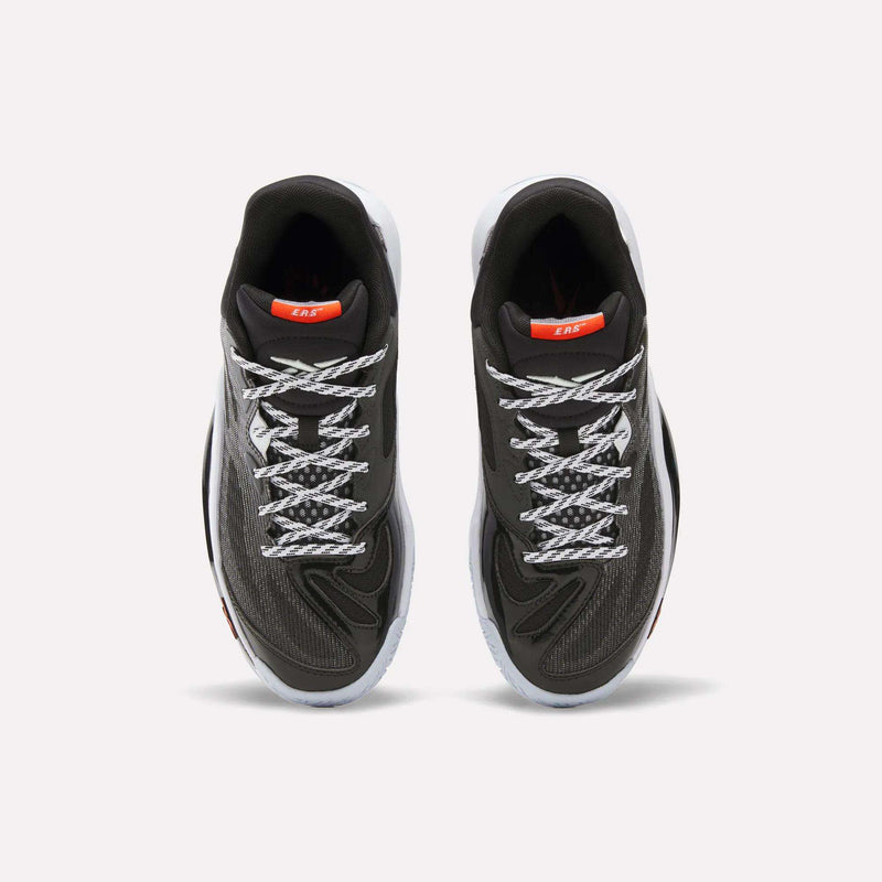A pair of Reebok Engine A 26 Basketball Shoes in black, featuring a breathable engineered mesh upper, white laces, and orange tongue labels, displayed from an overhead perspective on a white background.