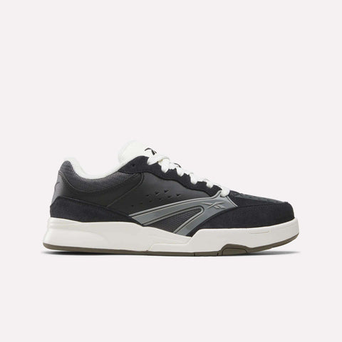 The Reebok Omni Edge Shoes, in a Black/Almost Black/Chalk colorway, feature a classic hoops-inspired design crafted from premium materials, with white cushioned soles, white laces, and subtle branding on the side, displayed against a plain light background.