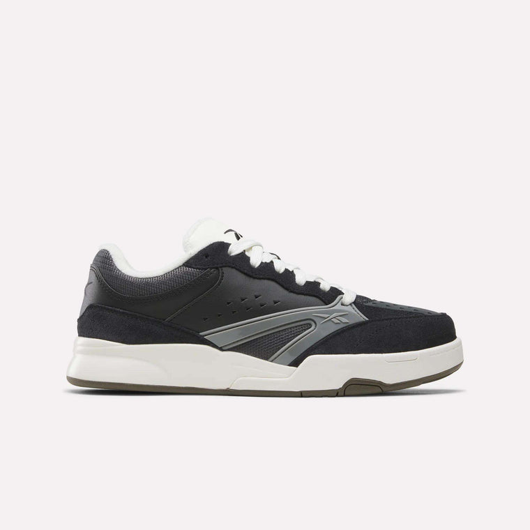 The Reebok Omni Edge Shoes, in a Black/Almost Black/Chalk colorway, feature a classic hoops-inspired design crafted from premium materials, with white cushioned soles, white laces, and subtle branding on the side, displayed against a plain light background.