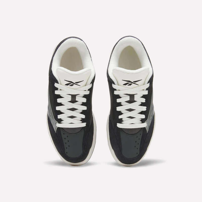 A pair of Reebok Omni Edge Shoes in black with white soles and white laces, featuring the Reebok logo on the tongue, viewed from above against a light background.