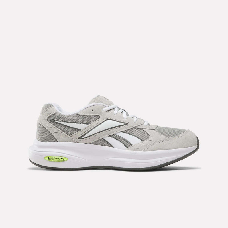 Experience versatile comfort with the Reebok Men’s DMX Comfort+ Walk Ultra Shoes in Aha - New Grey 2/White. Designed for all-day support, these athletic sneakers feature breathable mesh and suede panels paired with classic white laces. The white sole is highlighted by black and white midsole accents, while a green DMX logo details the heel. Engineered with DMX Comfort+ technology, they deliver outstanding cushioning for your daily walks.
