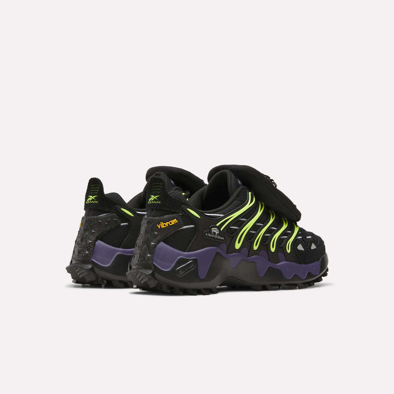 Reebok x A Herd of Bison Men’s Trailzillo DMX Shoes in black and purple with neon green lacing overlays and a chunky, Vibram rubber lugged sole.