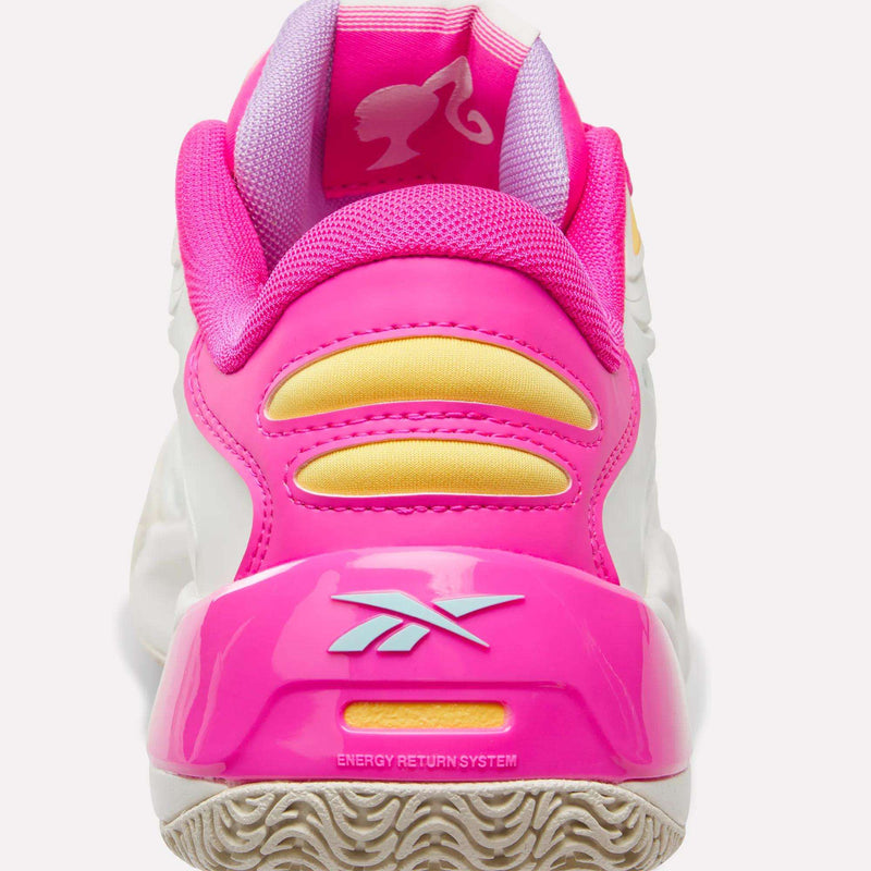Back view of the Reebok x Barbie x Angel Reese 1 Shoes in white and pink with yellow accents, featuring the Reebok logo and a Barbie silhouette on the inner heel. Part of the Reebok x Barbie basketball shoes collection inspired by Angel Reese, these sneakers have a sole with "ENERGY RETURN SYSTEM" text.