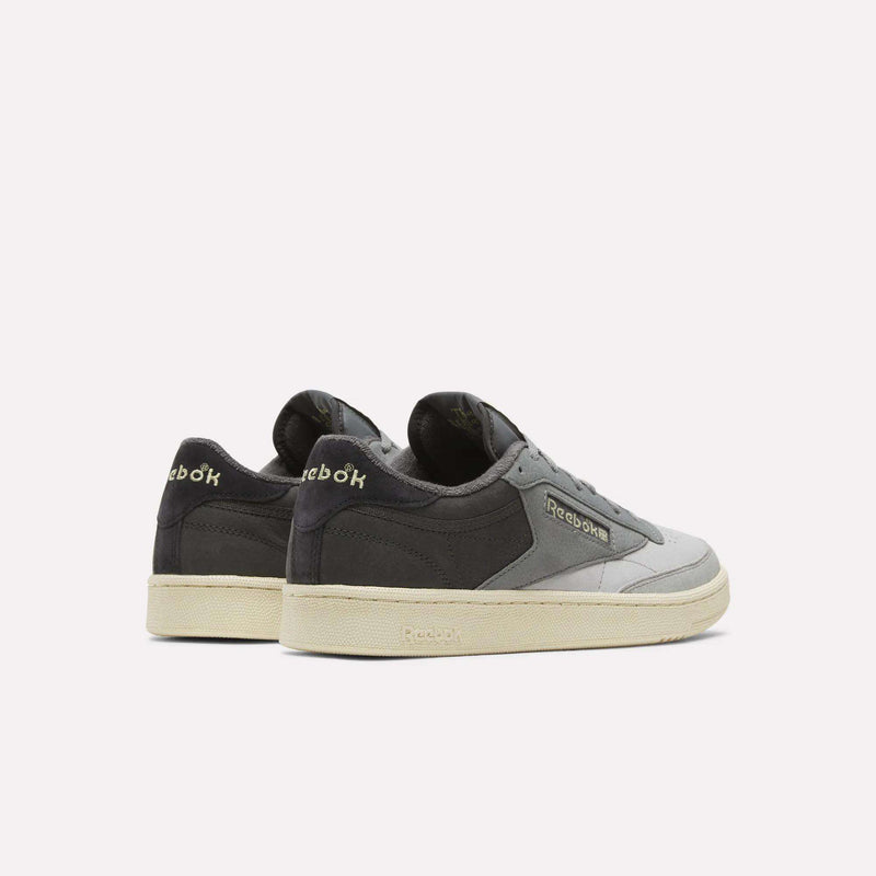Men’s Club C 85 Shoes in two-toned gray and black with off-white rubber soles.