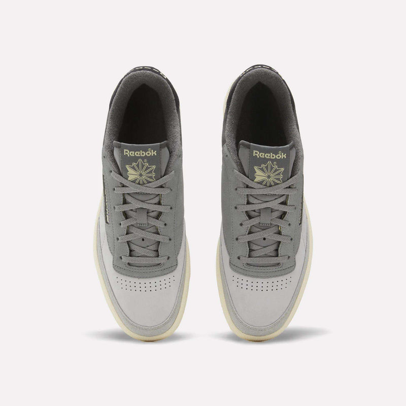Top-down view of a pair of gray Men’s Club C 85 Shoes with laces, a perforated toe box, and dark gray heel collars.