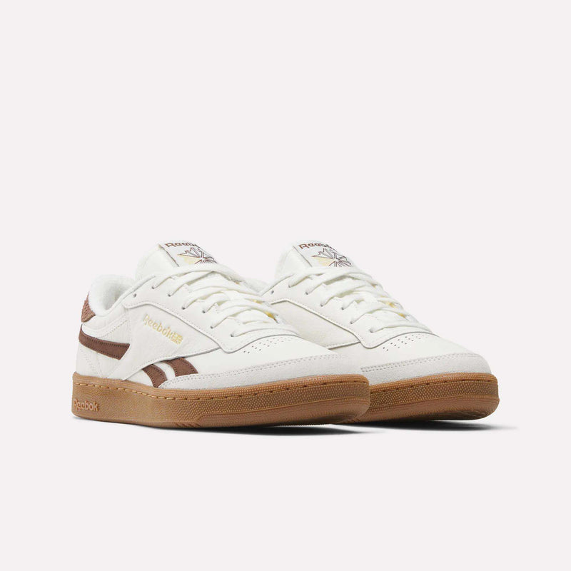 A pair of Reebok Men's Club C Revenge Vintage Shoes in white leather with brown accents and a gum sole, shown on a plain white background. The design features the Reebok logo on the side and tongue.