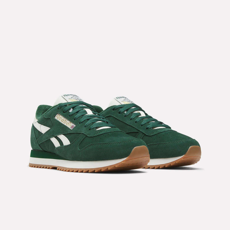 A pair of Reebok Men’s Classic Leather Ripple Shoes in green, featuring white accents, gum soles, white laces, and a cushioned EVA midsole, displayed against a plain white background.