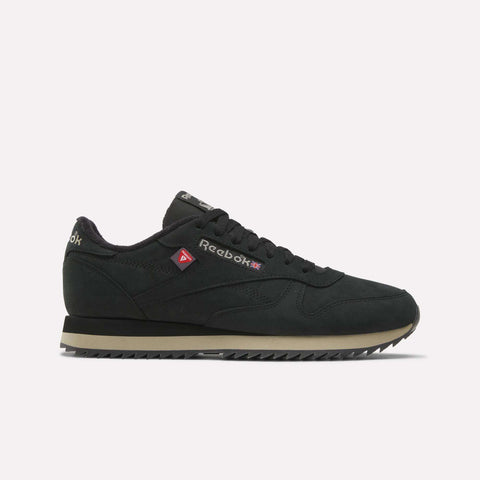 A side profile view of the Reebok Men’s Classic Leather Ripple Shoes in Black/Elevatedbeige/Black, featuring a beige EVA midsole and zigzag tread, displayed against a plain white background.