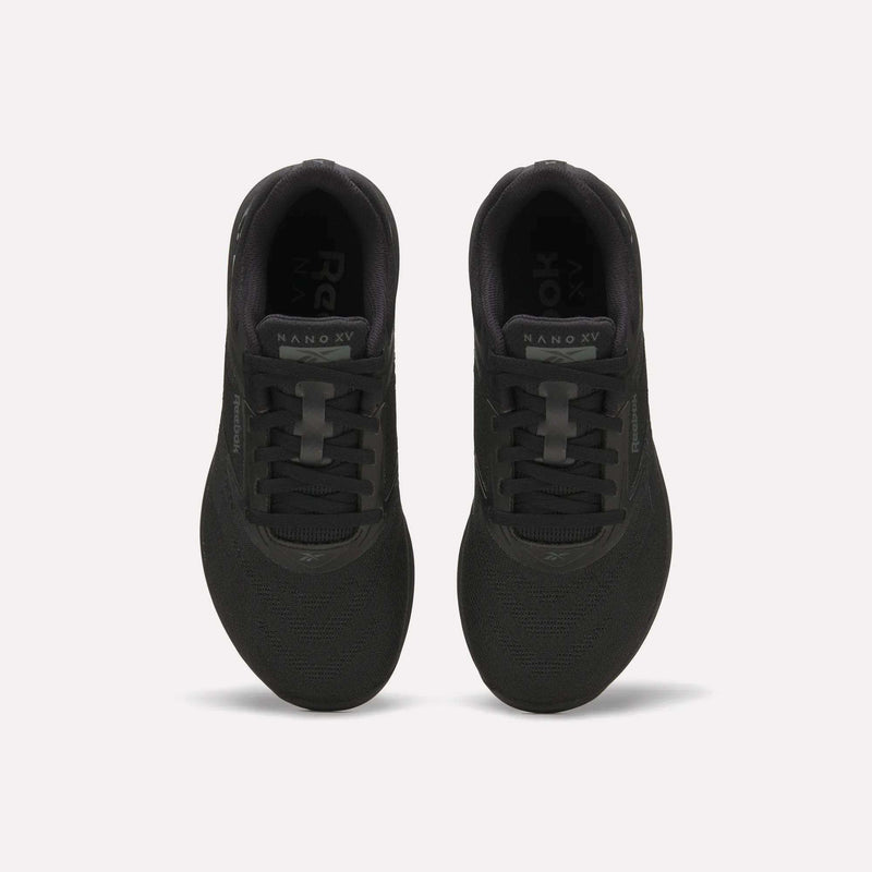 A pair of Women’s Reebok Nano X5 Training Shoes in black are viewed from above, highlighting the laces, tongue, and Nano X5 branding on each shoe. Designed as premium training footwear, they deliver exceptional comfort for every workout. The background is plain white.