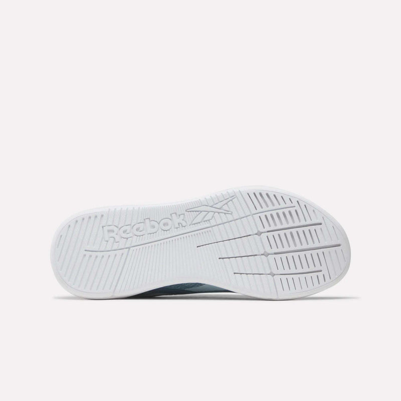 The image shows the white sole of Reebok Nano X5 Women's Training Shoes, displayed horizontally with visible tread pattern and Reebok logo, emphasizing optimal comfort against a plain, light background.