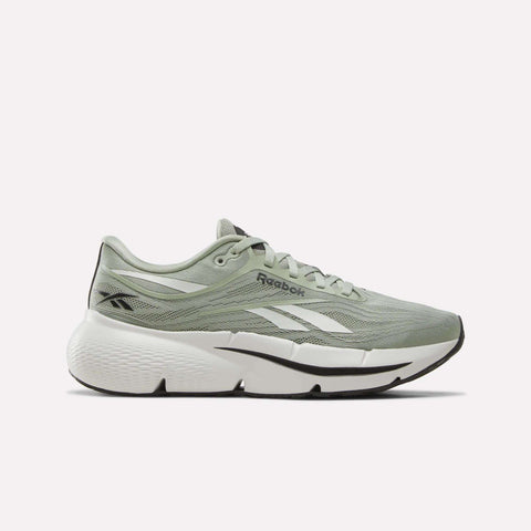 Introducing the Reebok Men’s Zignition Running Shoes in green, grey, and black. These men’s running shoes feature a breathable mesh upper, a wide forefoot for extra comfort, a thick and springy cushioning sole for enhanced performance, a white midsole, black outsole, and the iconic white Reebok logo.