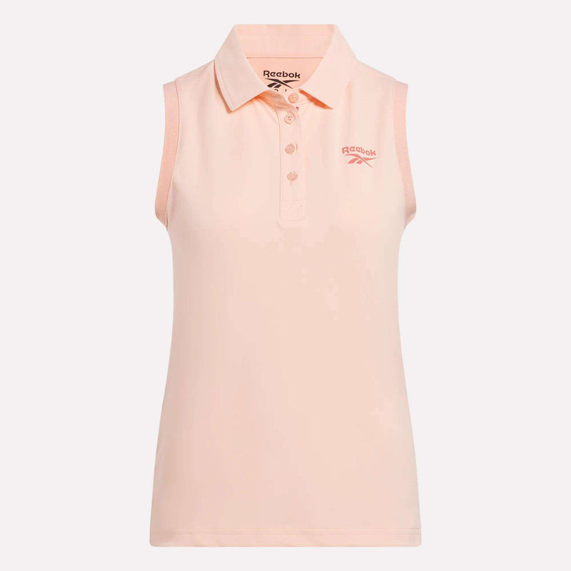 Reebok Women's Micro Pique Sleeveless Polo Shirt in light pink, with collar and button placket, UPF-rated and Reebok logo on the left chest, shown on a plain white background.