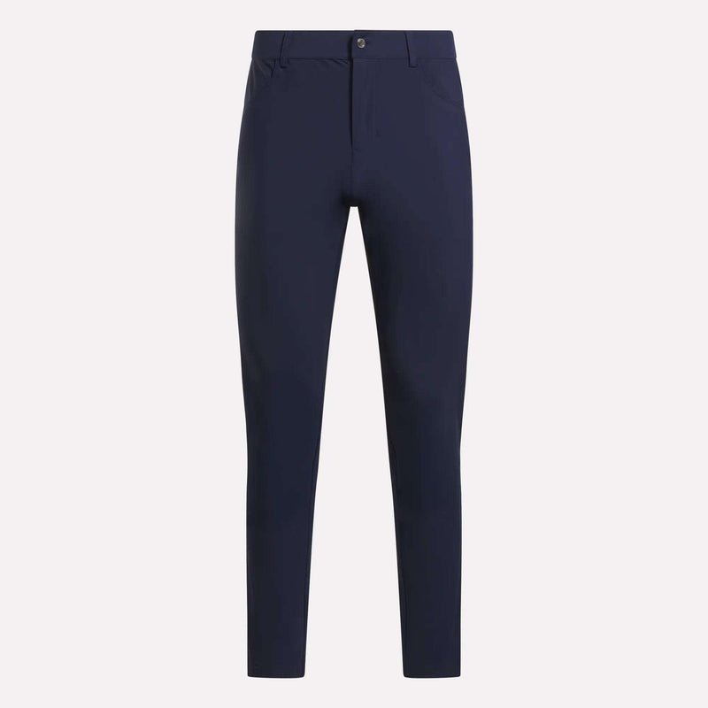 The Reebok Men's Favorite 5-Pocket Relaxed Fit Golf Pants in navy blue feature wrinkle-resistant fabric, a button and zip closure, front pockets, and belt loops, shown against a plain light background.