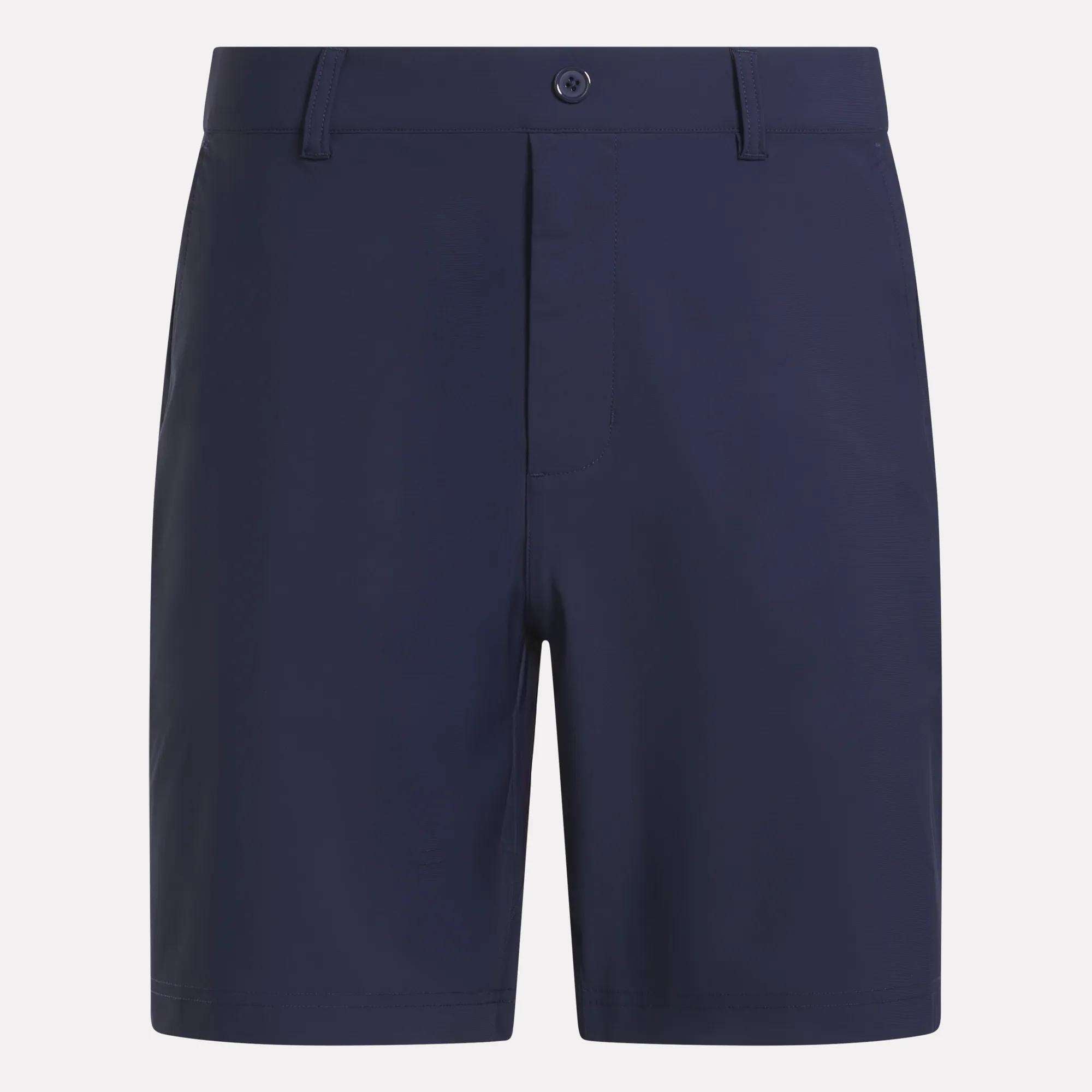 Reebok Men's Favorite Golf Shorts 8.5" in navy blue feature a knee-length cut, flat front, button and zipper closure, belt loops, and stretchy moisture-wicking fabric, shown against a plain white background.