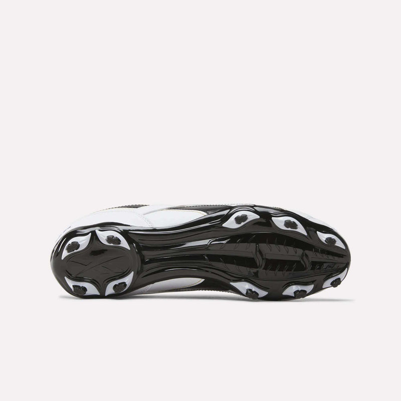 The image shows the black and white underside of the Reebok RBK800 League Firm Ground Soccer Cleats, featuring molded studs for traction on firm ground.