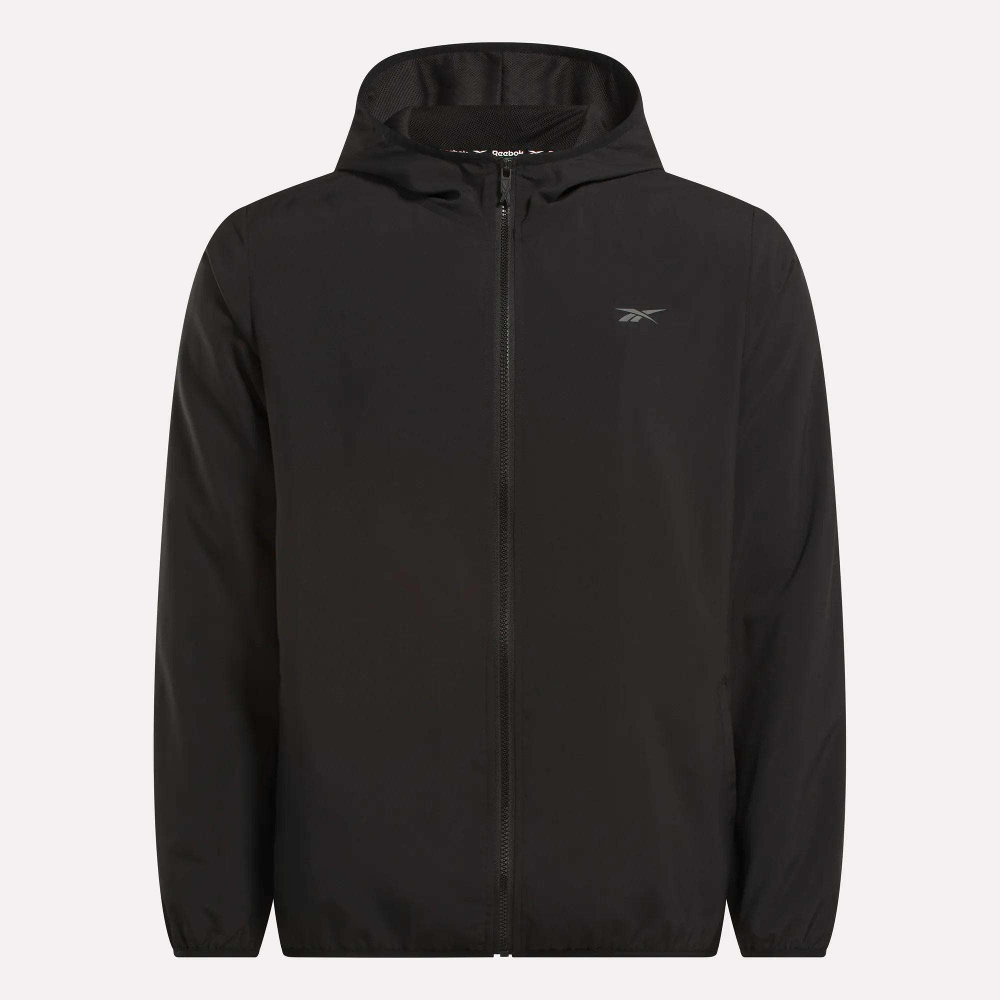 The Reebok Men's Woven Jacket features a plain black zip-up hooded design, long sleeves, relaxed fit, lightweight woven fabric, and a small logo on the left chest.