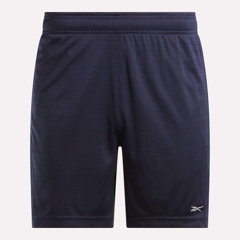 Reebok Men's Inclination Shorts in navy blue, featuring an elastic waistband and a small white logo on the lower left leg, designed for workout performance, shown against a plain light background.