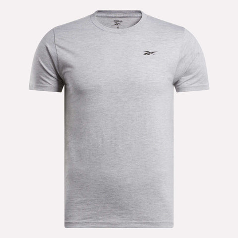 The Reebok Men's Small Logo T-Shirt features a relaxed fit, light grey color, and a small black Reebok logo on the left chest, shown against a white background.