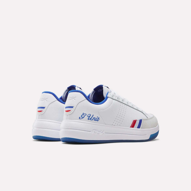 The Reebok x G-Unit G6 Men’s Shoes by Reebok are white low-top sneakers featuring blue accents, red and blue side stripes, and “G Unit” in blue script on the heel. With white soles highlighted by bold blue details, these shoes capture early 2000s hip-hop style.