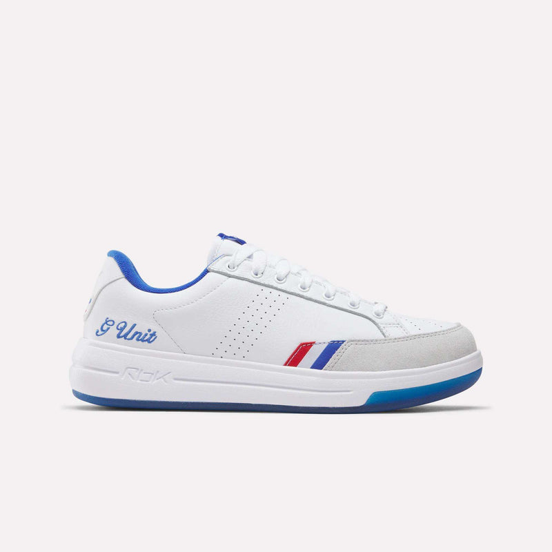 Featuring a white, blue, and red colorway with blue trim, signature blue and red side stripes, G-Unit branding on the heel, perforated accents, white laces, and a blue-tinted sole, these iconic sneakers are the Reebok x G-Unit G6 Men’s Shoes by Reebok—shown here against a plain light background.