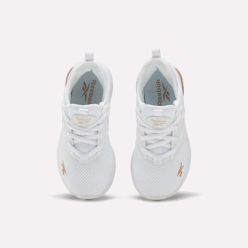 A pair of Zome Flare Shoes by Reebok for little kids in white, viewed from above to highlight the laces, mesh texture, and gold Reebok logos on the tongues and outer sides. These comfortable athletic sneakers are ideal for active children and are displayed against a plain, light-colored background.