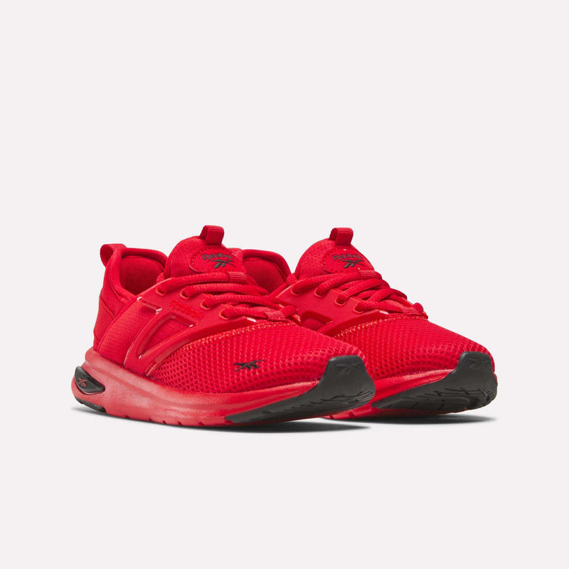 The Reebok Zome Flare Shoes - Little Kids feature vibrant red mesh uppers, black soles, and matching red laces. Displayed on a white background, these comfortable sneakers are designed for lightweight comfort, making them the perfect choice for kids’ shoes.