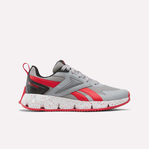 The Pyro Storm Shoes - Big Kids by Reebok are shown in a side profile against a plain white background. Featuring a Jet Black, Lime Punch, and Blue Aster colorway, these lightweight running shoes combine style and comfort for active kids on the go.